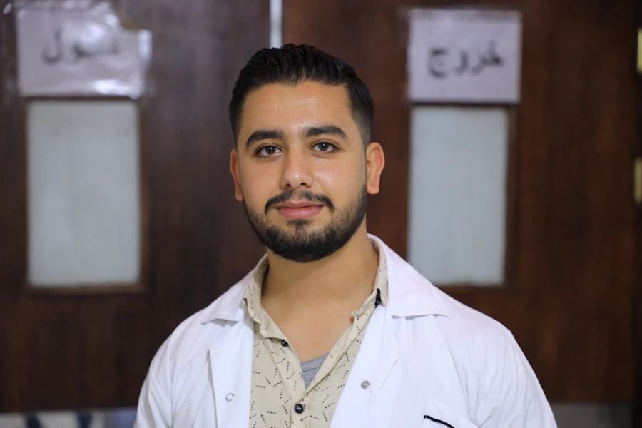 A doctor in a white lab coat