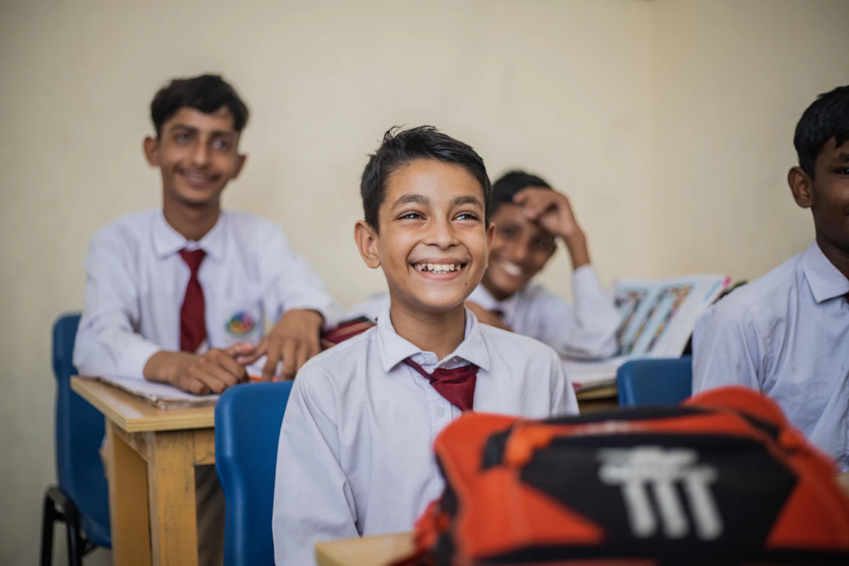 Students in school uniform at their desks